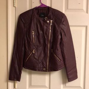 Leather coat with quilted lining
